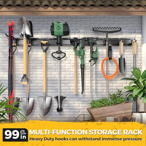 Wall-mounted garage organizer holding tools and folding chairs
