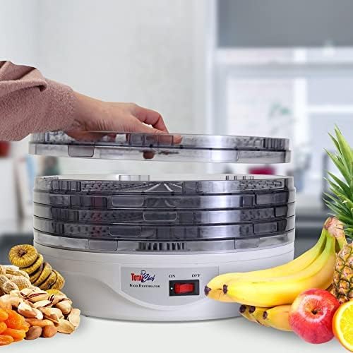 A hand placing the transparent lid onto the stacked drying trays of the Total Chef Food Dehydrator.