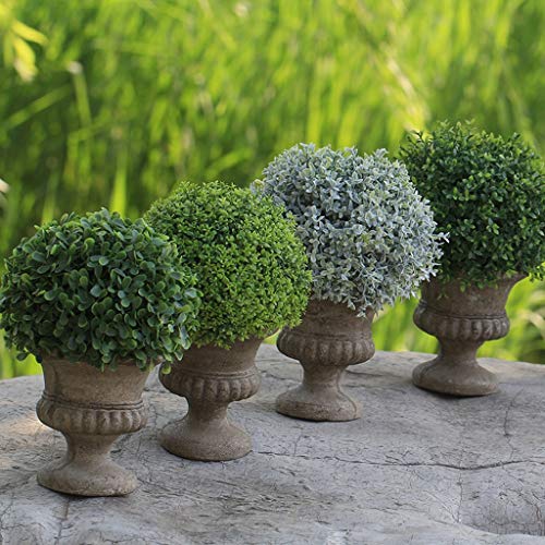Plantes vertes et fleurs artificielles en pot pour decoration de table