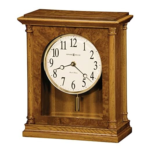 Howard Miller Carly Mantel Clock 635-132 – Golden Oak Finish, Antique Home Decor, Brass-Finished Cylindrical Pendulum, Volume Control, Quartz, Dual-Chime Movement