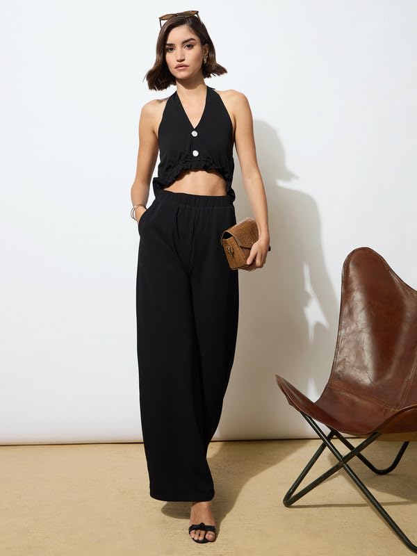 Image of barcino Black Knitted Halter Neck Cut-Out Jumpsuit