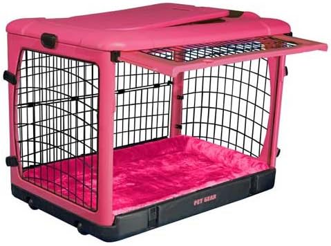 pink plastic dog crate