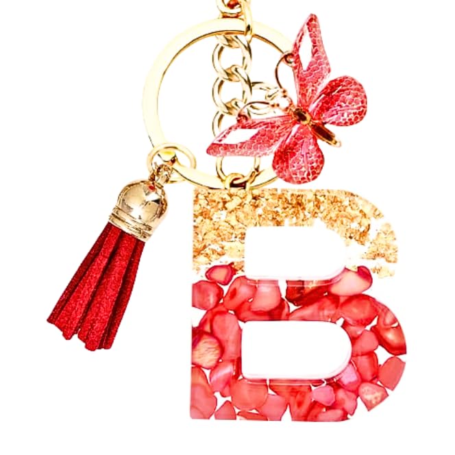 riKRishnaya ArtworksAll A-Z Alphabet Red Stones Initials Resin keychain for Women and Men for Handbag or Bike with Glitter or Real Flowers and Tassel