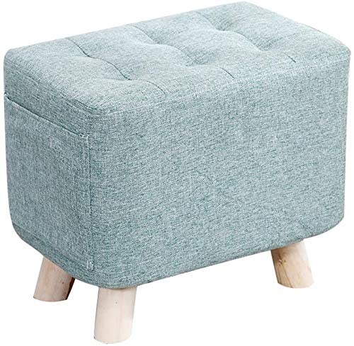 Canapé salon sublimé par un repose-pieds ottoman en bois vert de 35 cm