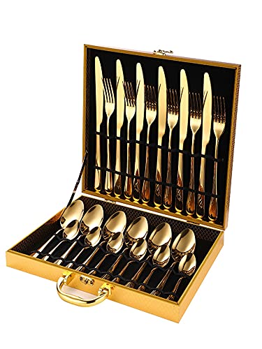 Couverts de table noirs et dorés incluant fourchettes couteaux cuillères