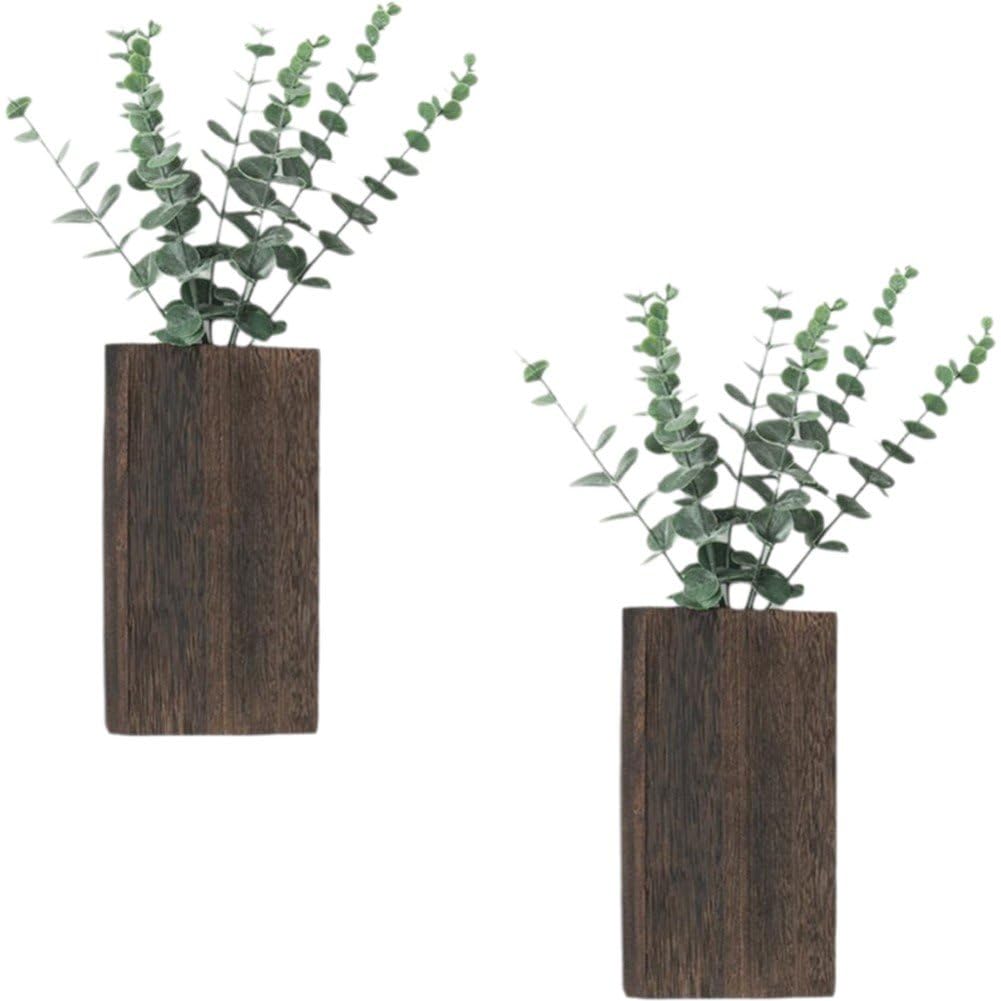 Pots de fleurs muraux en bois pour une ambiance bohème avec eucalyptus dans la chambre