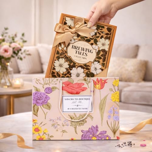 Image of Sancha Tea Boutique, Brewing Tales Collection, Luxury Gift Box with Ginger Green (50g), Rose Oolong (25g) & Premium Mesh Infuser | Botanical Print Box with Ribbon & Carry Bag