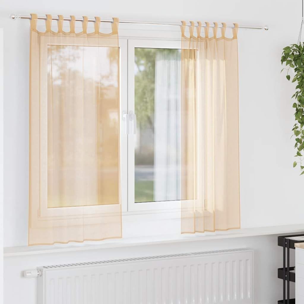 Rideaux en voile couleur sable pour adoucir l'ambiance de votre chambre à coucher