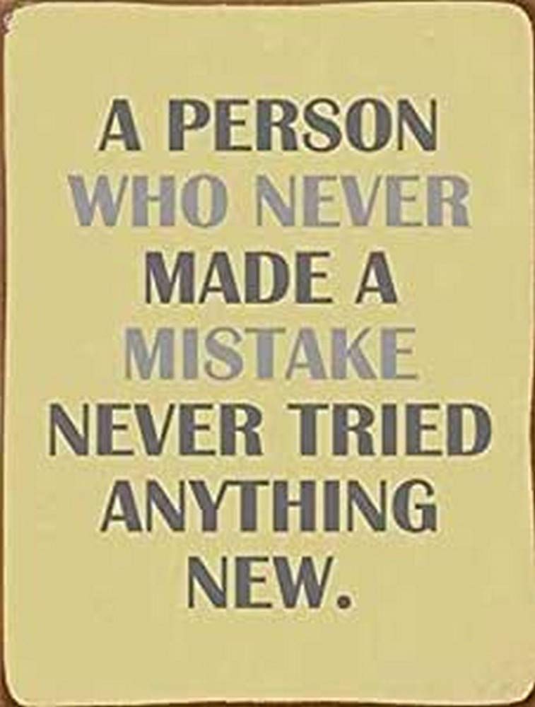 Sign - A person who never made a mistake, never tried anything new