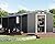 Jocisland 12x12x6.6 FT Galvanized Metal Storage Shed with Open Firewood Bay, Sliding Doors & Ramp, 2 Windows & Vents, Weather-Resistant Outdoor Tool/Garden Shed, Dark Grey/White