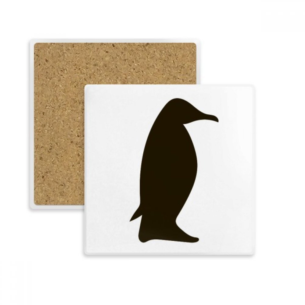 Porte-tasse pingouin noir pour décorer la table basse du salon