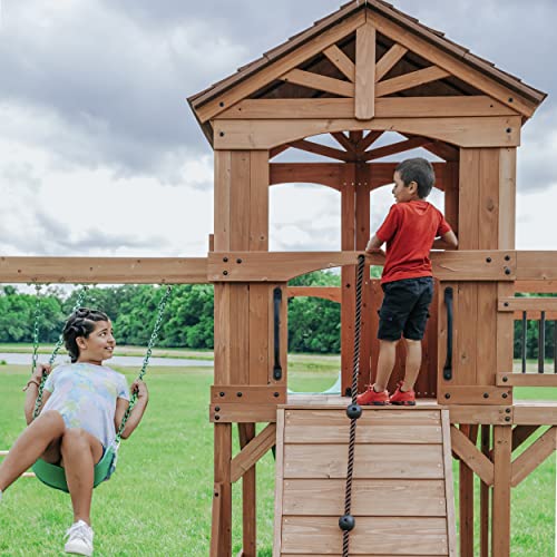 Backyard Discovery Sterling Point All Cedar Wooden Swing Set, Raised Clubhouse, Wave Slide, Web Swing, Climbing Wall, 10Ft Wave Slide, 2 Belt Swings, Front Porch, Bridge #TOP6