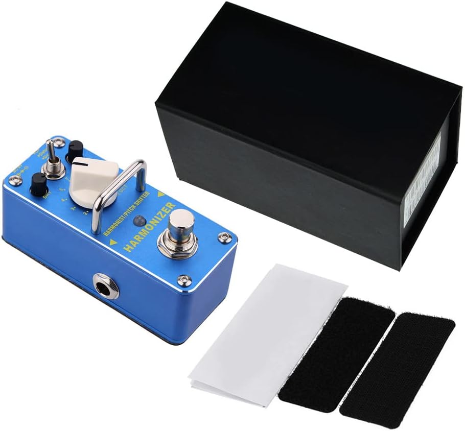 Btuty AHAR-3 Harmonizer pedal with included adhesive tapes and user manual, next to its hardcover box