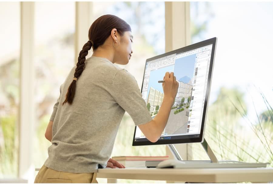 Person using Surface Pen on Microsoft Surface Studio 2+ touchscreen