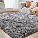 tapis gris shaggy 160x230 Matériau de mise à niveau à 3 couches: le tapis comporte une couche supérieure de matériau en velours doux avec une couche intermédiaire en éponge qui est plus douce et luxueuse sous le pied. Et la conception de fond antidérapant pour garder le tapis autant que possible rester en place. Vos enfants ou vos animaux de compagnie peuvent jouer très joyeusement et confortablement sur le tapis. Vous vous sentirez très doux sur vos pieds. Une courte relaxation soulagera grandement votre fatigue.