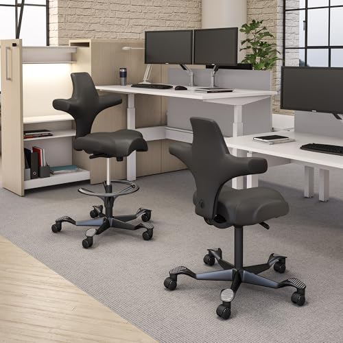 Image of HAG Capisco Sit to Stand Chair-Black Frame-Upholstered Gray Ash Vinyl-with Foot Ring