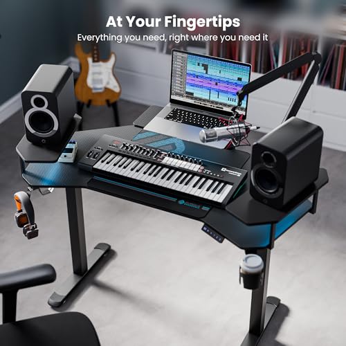Image of EUREKA ERGONOMIC Aero 55 Inch W Shaped Electric Standing Desk, Height Adjustable Computer Gaming Desk with LED Monitor Shelf, Mouse Pad, Headphone Hook, Cup Holder, Carbon Black