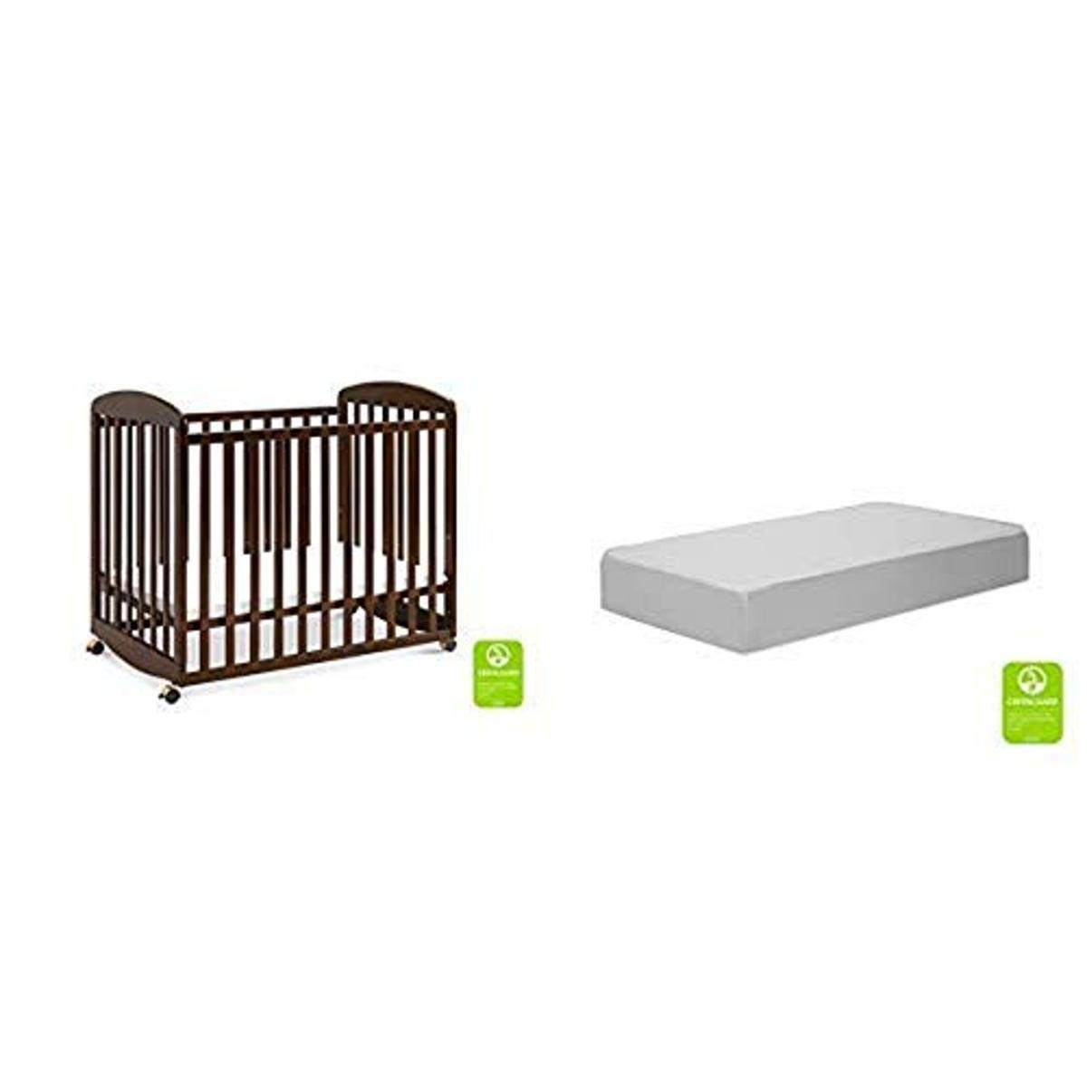 Photo 1 of Davinci Alpha Mini Rocking Crib in Espresso with Complete Slumber Mini Crib Mattress Espresso Crib & Mattress