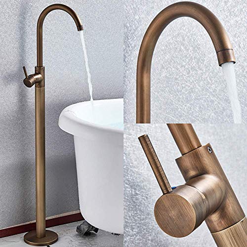 Robinetterie de salle de bain dorée avec mitigeur de douche sur colonne au sol