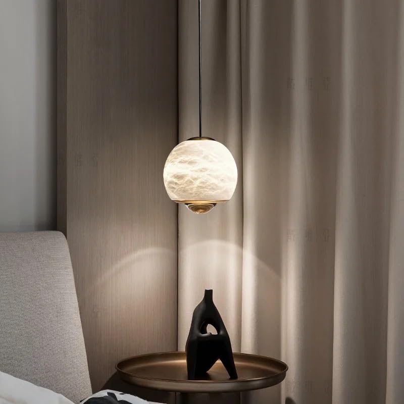 Suspension lumineuse moderne en marbre pour illuminer une chambre chaleureuse
