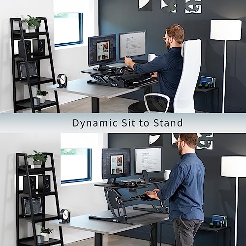 Image of VIVO Black 48 inch Standing Desk Converter, DESK-V048V | Extra Large, Height Adjustable, Stand Up Desk Riser, Wide Keyboard Tray, Dual Monitor and Laptop Workstation, V Series