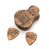 Este es un conjunto de accesorios para guitarra, que incluye soporte para púas de hierro y 4 púas de madera diferentes.