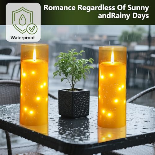 Image of kakoya 11 inch x 4 inch Large Outdoor Waterproof Flameless LED Candles with Remote and Timer,Acrylic Pillar Candles Battery Operated with Embedded Star String for Porch,Patio,Outdoor Decor,Set of 2(Gold)