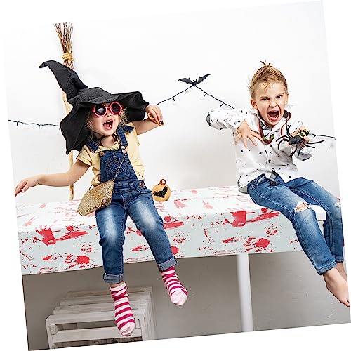 Décorations nappe Halloween blanche et chemin de table style vérificateur