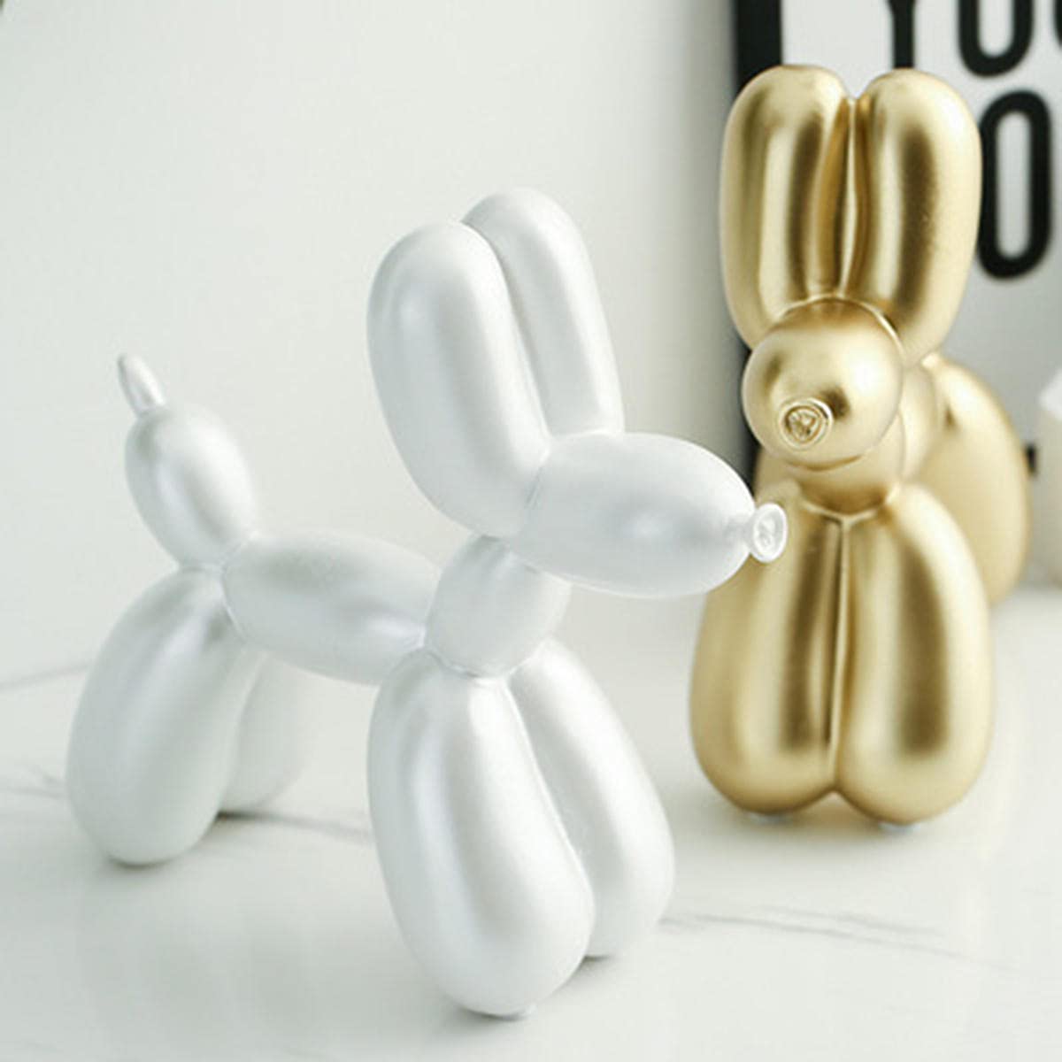 Statuetta ornamentale in resina con palloncino e animali