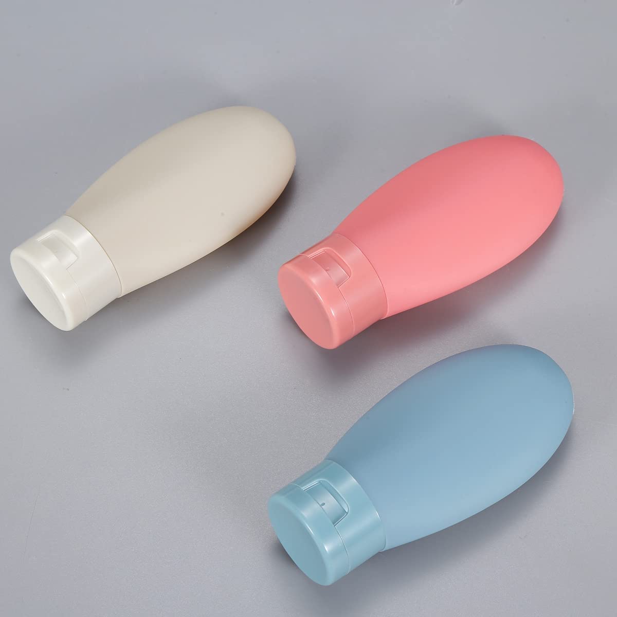 C2SK 3 Pcs Travel Bottles Set for Toiletries | Refillable Silicone Bottles | Carry-On Approved Travel Kit for Shampoo, Lotion, Cream (Multicolor) 4
