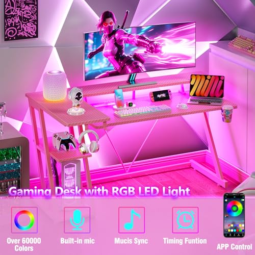 Image of Korfile 55 Inch Pink Gaming Desk with Power Outlet & LED Lights, Corner Computer Desk with 3 Tiers Storage Shelves, L Shaped Gaming Desk with Monitor Stand for Bedroom