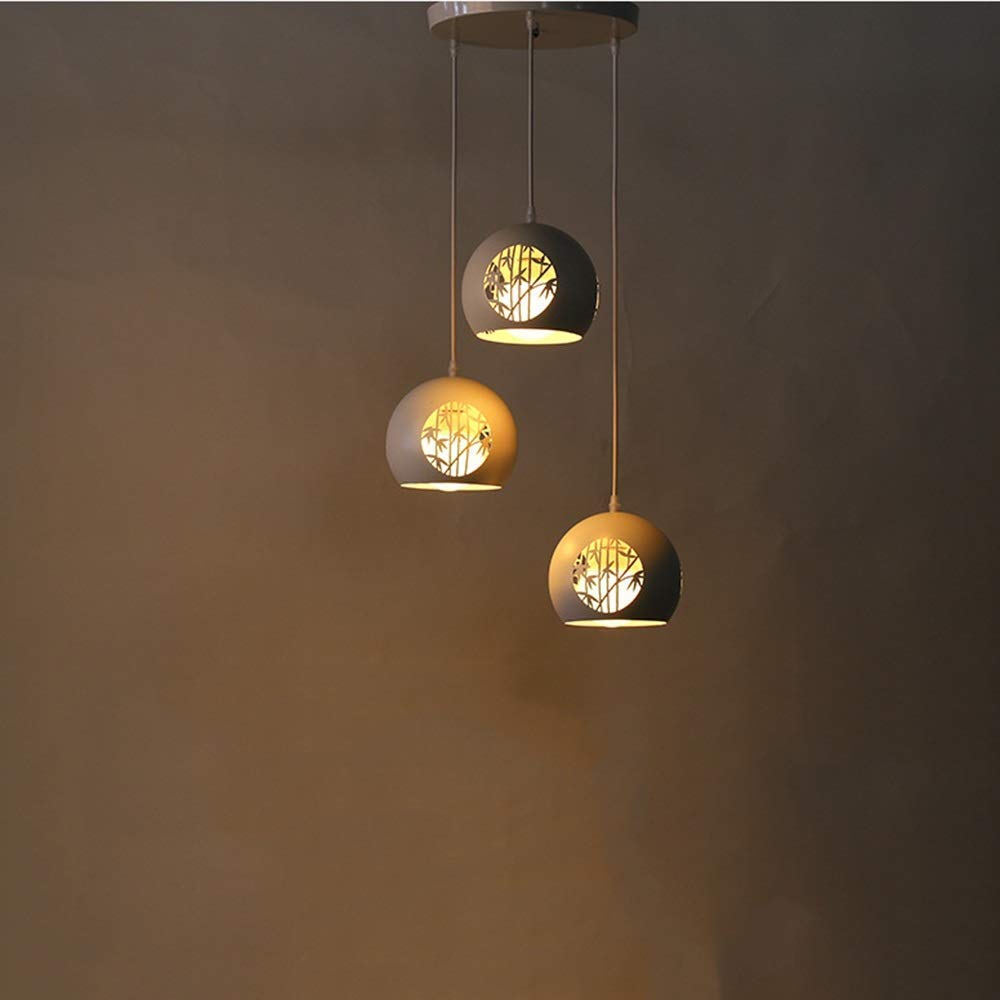 Lustre en fer forgé creux rétro au design industriel soigné à triple ampoule