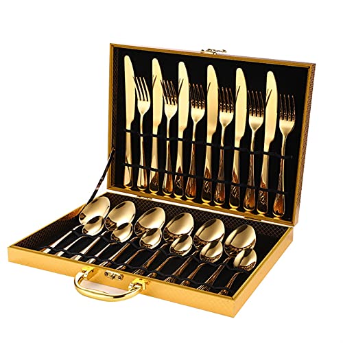 Couverts de table noirs et dorés incluant fourchettes couteaux cuillères