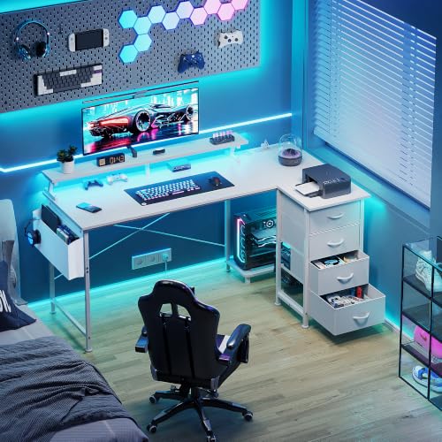Image of VERMESS 63 inch Reversible L Shaped Gaming Computer Desk, Corner Desk with Power Outlets & Monitor Stand, Writing Study Table with 4 Storage Drawers, Desk with LED Lights, White