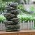 9x5x14 Indoor Gray Stone-Look Water Fountain, 7-Tier Polyresin Cascading Rock Tabletop Fountain with LED Light
