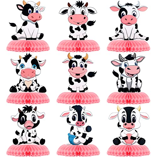 Décoration vache rose en nid d'abeille pour un anniversaire d'enfant réussi