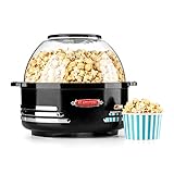 Cuando el sofá te invita a sentarte cómodamente, a esconderte entre los cojines y a ver una película en tu sistema de home cinema favorito, sólo te falta un elemento: crujientes palomitas. La  máquina de palomitas  Couchpotato de  oneConcept  en diseño retro pone en marcha la placa de calentamiento y prepara rápidamente el crujiente tentempié.