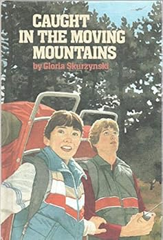 Hardcover CAUGHT IN THE MOVING MOUNTAINS by GLORIA SKURZYNSKI LOTHROP 1984 Weekly Reader [Hardcover] Gloria Skurzynski Book