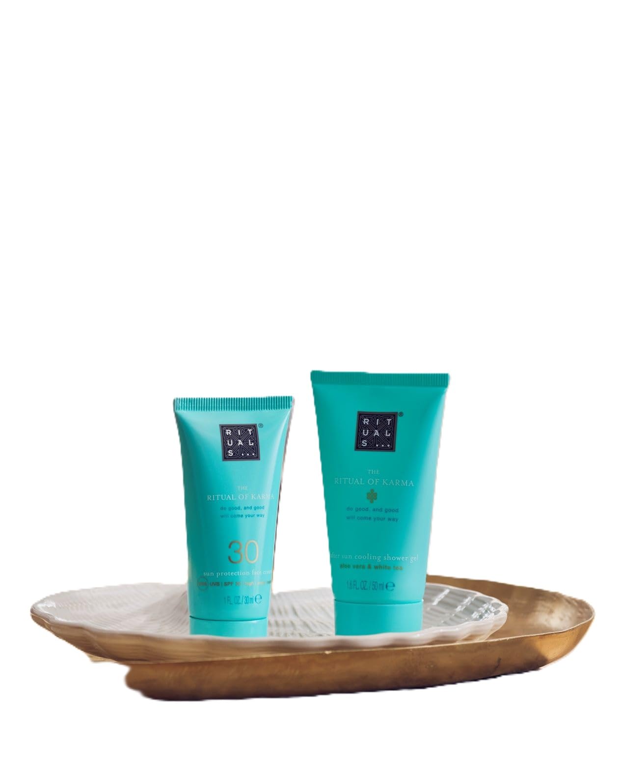 The Rituals of Karma Summer Duo includes a 50ml After Sun Cooling Shower Gel, SPF 30 Sunshine Protection Face Cream, and a 30ml Mini After Shower Foam, infuse your skin—and your summer—with kindness