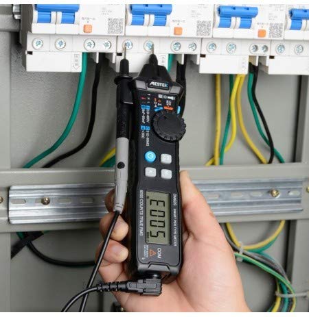 MESTEK DM92S Multimeter being used to measure an electrical circuit within a panel