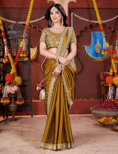 Image of DHARMEE Women's Elegant Designer Sarees Premium Rangoli Fabric with Embellished Border, Lightweight and Stylish Ethnic Wear - Perfect for Parties, Weddings, and Festive Occasions..