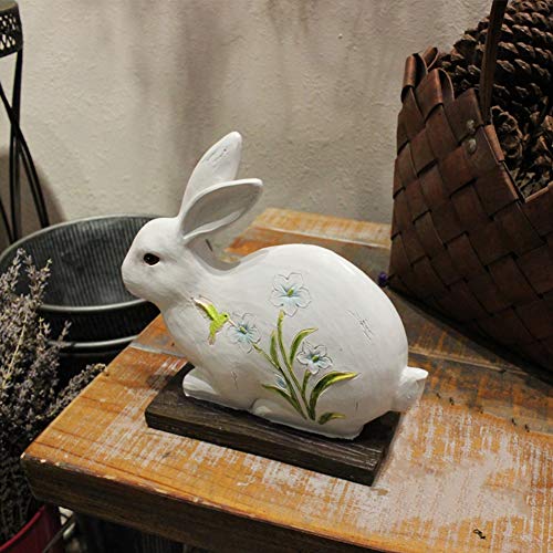 Statue de lapin extérieur horizontal pour embellir un parterre fleuri