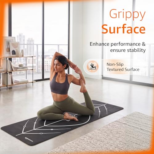 Image of Amazon Basics Yoga Mat with Carry Bag | 6 mm Thick Cushioning | GuideAlign Posture Alignment Markings | Reversible Dual-Texture Non-Slip Surface | Lightweight & Durable | Floor Protection | Ideal for Yoga, Stretching & Fitness | 6 x 2 ft | Black & White