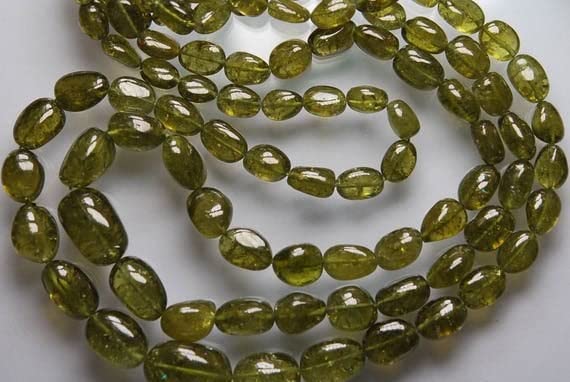 Grossular Garnet en perles lisses pour créer un collier bohème chic lors de vos soirées