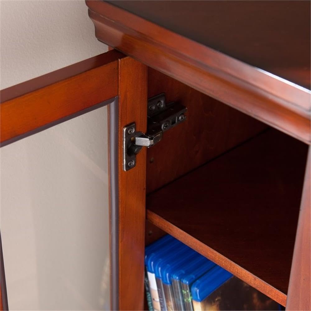 Close-up view of the interior of a side storage cabinet on the Southern Enterprises FR9316 Electric Corner Fireplace, showing a shelf and the door hinge mechanism.