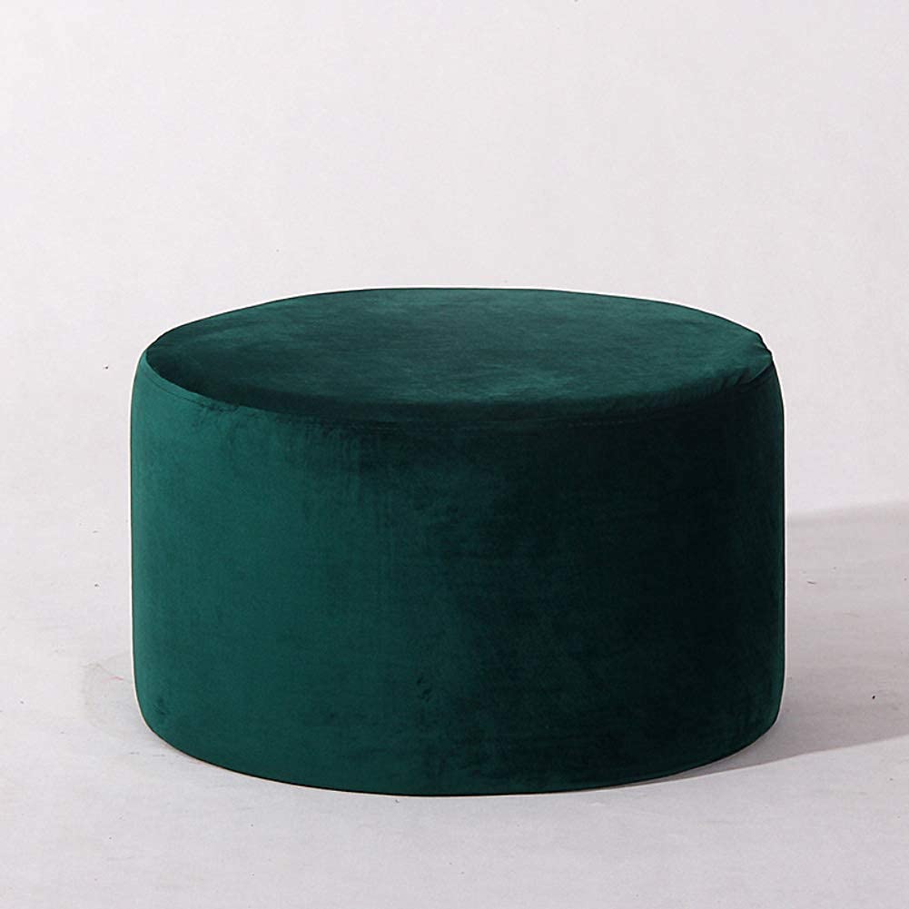 Pouf repose-pied vert pour créer un coin lecture cosy dans votre chambre