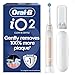 Oral-B iO2 Electric Toothbrush, 1 Gentle Care Toothbrush Head, 1 Travel Case, 1 Travel Refill Holder, Toothbrush for Adults (Calm Pink), Designed by Braun, 2 Pin Plug