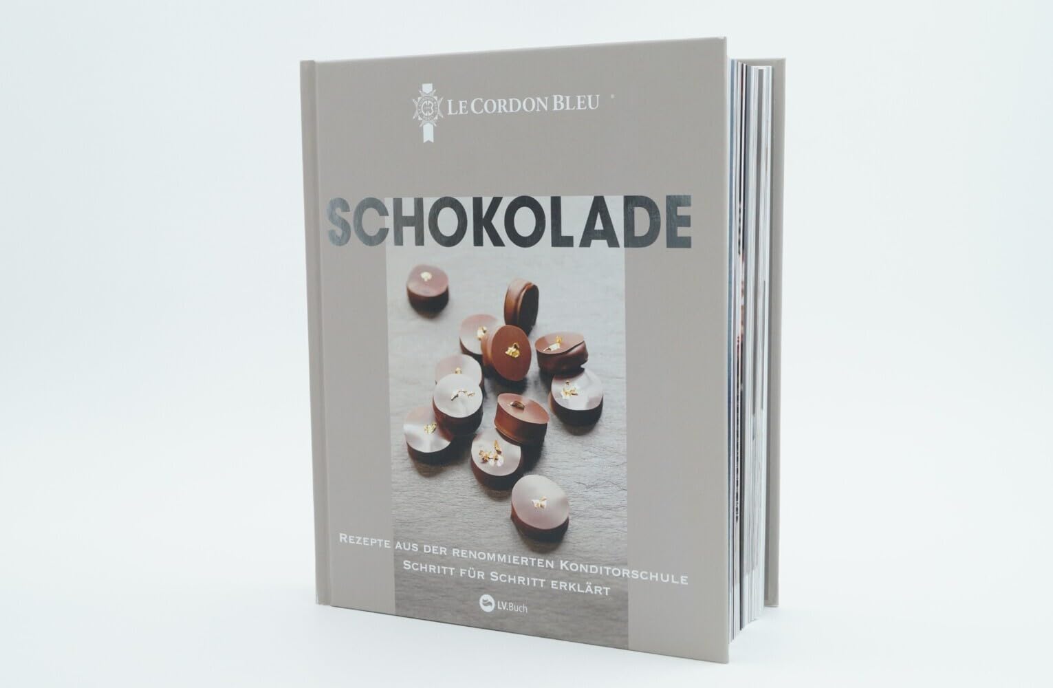 Schokolade: Rezepte aus der renommierten Konditorschule Schritt für Schritt erklärt. 170 raffinierte Rezepte und Tipps von Patisserie-Profis für köstliche Schokoladenkreationen: Ganache, Pralinen & Co