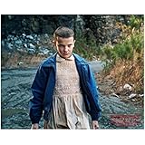Stranger Things (TV Series 2016 - ) 8 inch x10 inch Photo Millie Bobby Brown Blue Jacket Over Pink Dress Pose 1 kn