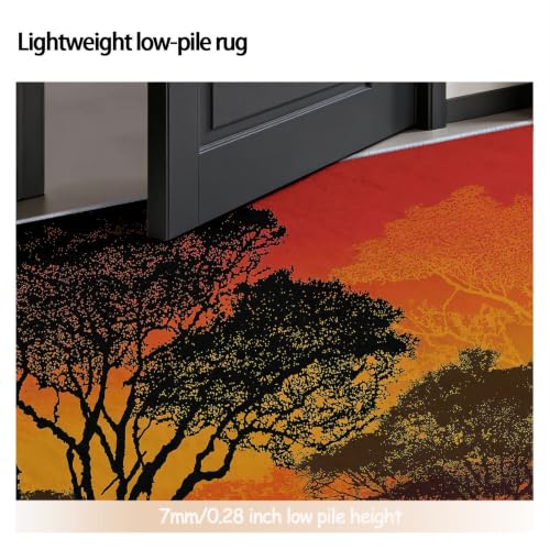 Tapis rond 90 cm silhouette d'arbres rouges lavable